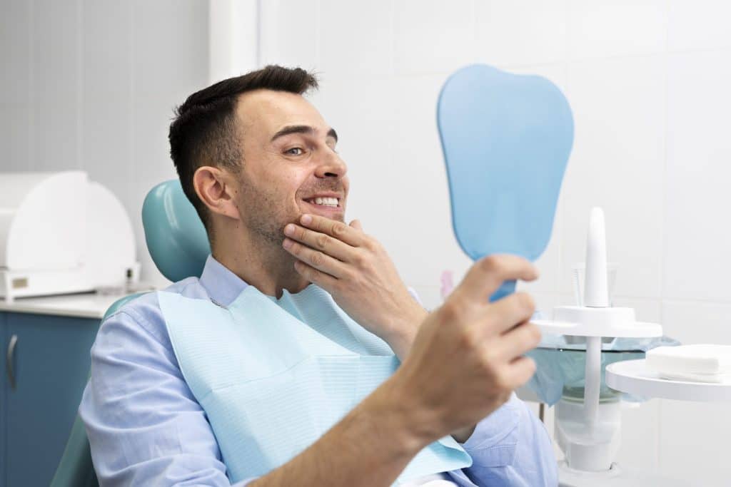 Happy client at a dental clinic