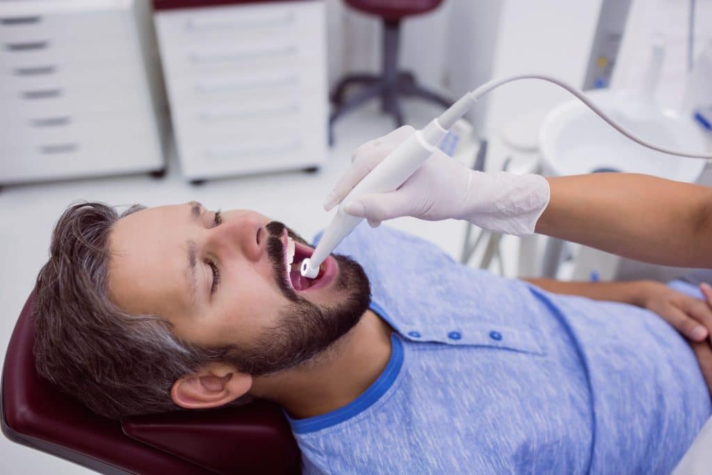 Close-up of a patient's mouth during a dental check-up