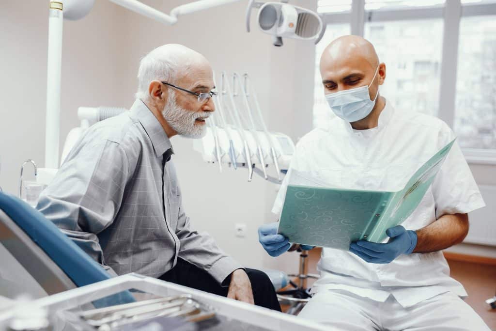 Older man sitting in the dentist's office