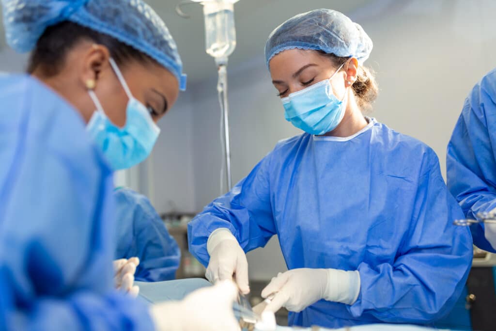 Surgical team in operating room - hip replacement surgery article image